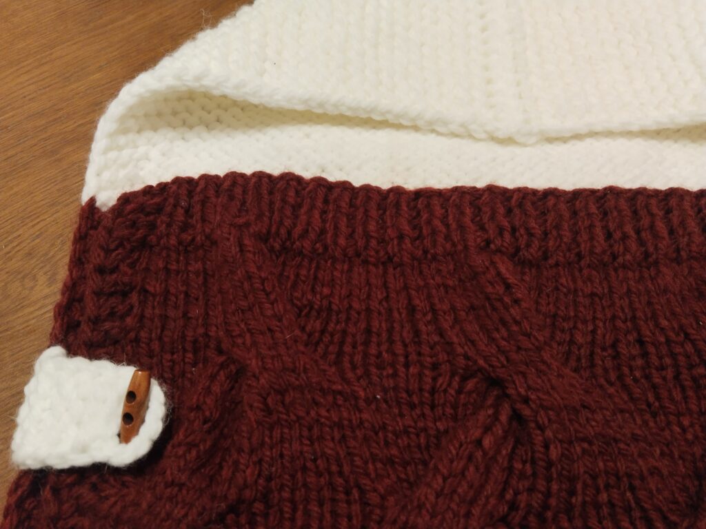 Вязаный конверт для новорожденного