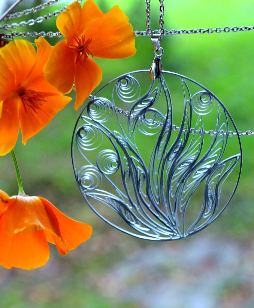 Комплект украшений кольца-квиллинг.